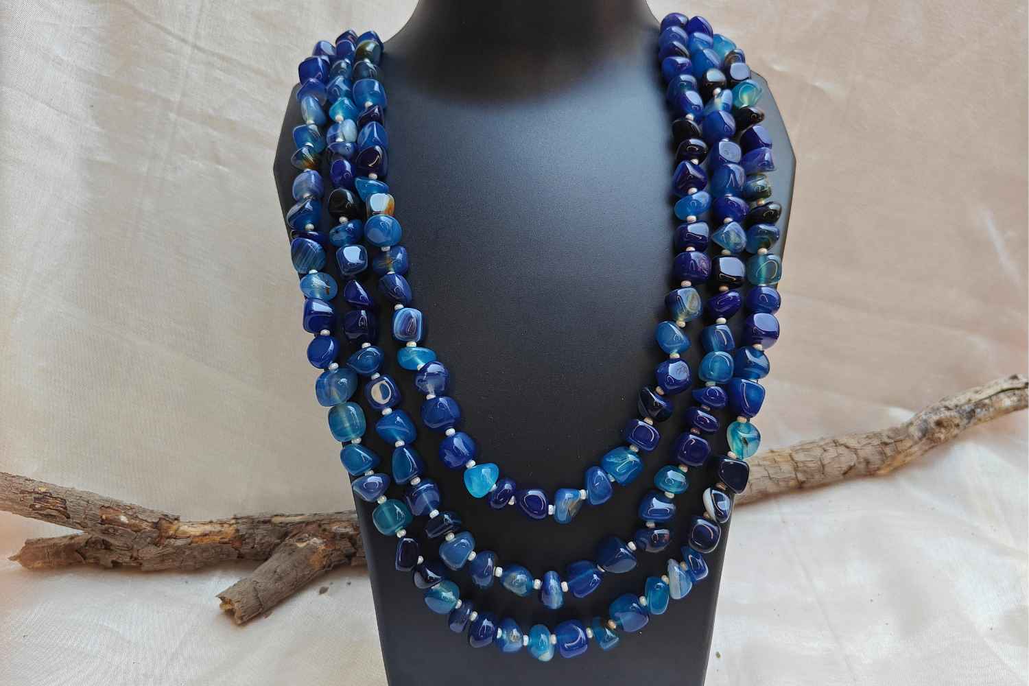Bead Mala Lapis Lazuli Royalty, a luxurious dark blue bead necklace featuring multiple layers of natural lapis lazuli stones.