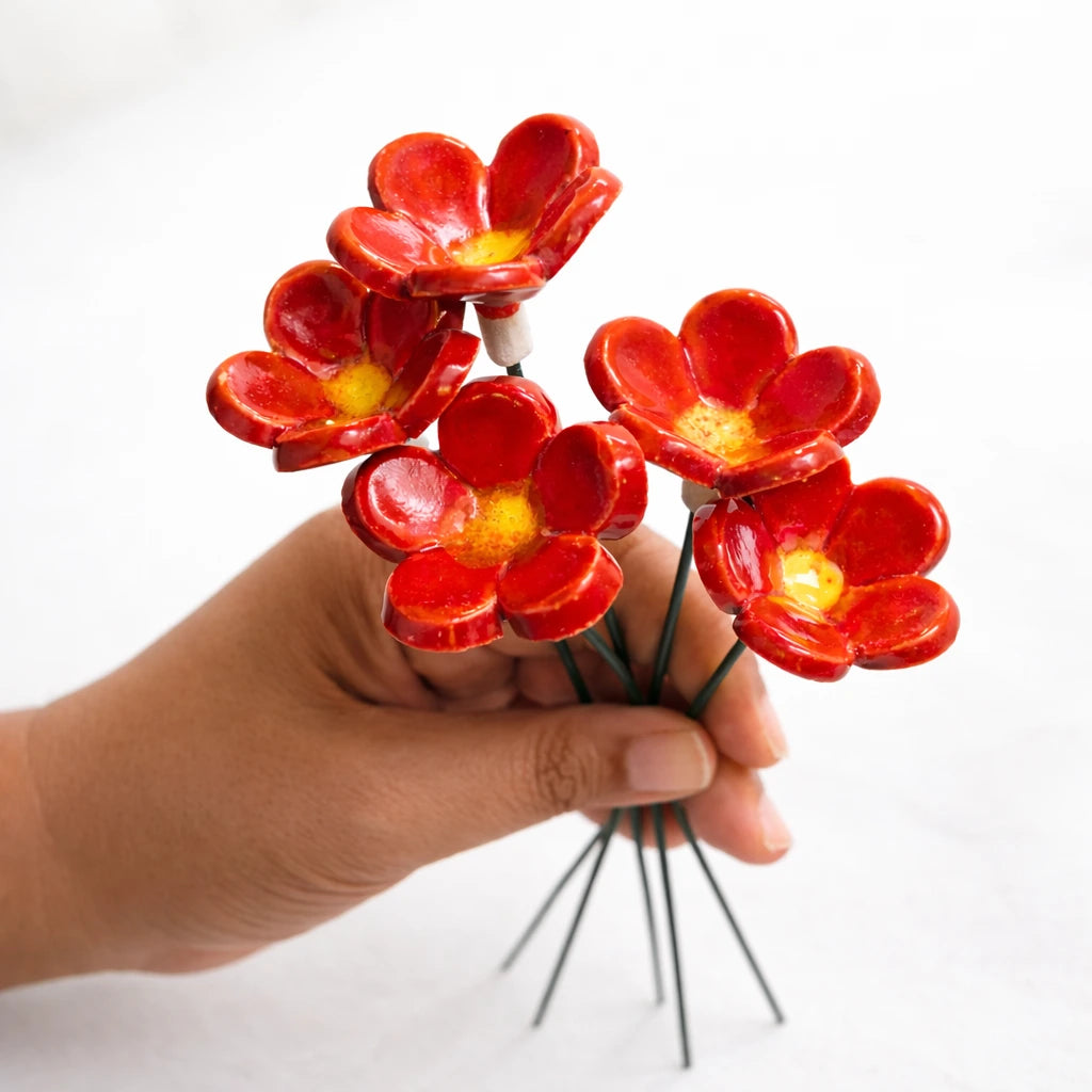 Handmade flower ceramic flower sticks in red and yellow, perfect for summer decor or vase styling.