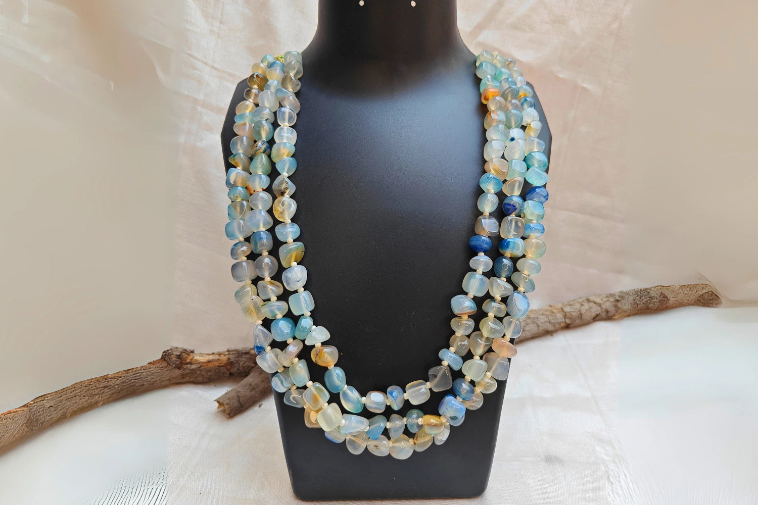 Bead Mala made of clear quartz, showcasing layers of natural gemstone beads for healing and positive energy.