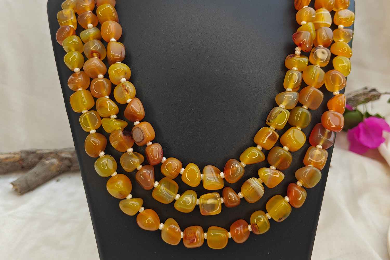 Bead Mala featuring vibrant yellow citrine stones, designed to bring positivity and joy with a multi-layered appearance.
